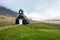 Old ancient wooden church called SaurbÃ¦jarkirkja in Raudasandur beach in Iceland.