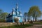 Old ancient wooden church of the Holy Life Giving Trinity in spring, Telyadovichi, Minsk region, Belarus