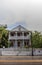 Old antebellum style cottage that is run down in Key West, Florida