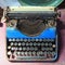 Old antique blue typewriter