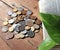 An old antique Indian paise coins. Old Indian vintage coins isolated on wooden background.