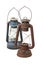 Old antique kerosene lanterns on a white background