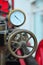 Old antique vintage fire pump pressure gauge and wheel