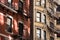 Old apartment building with fire escapes, Manhattan