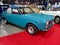 Old aqua blue 1972 Fiat 125 Sport coupe fastback berlinetta. Exhibit hall. Classic car show