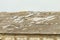 Old asbestos-cement roof of a dilapidated agricultural building