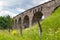 The old Austrian stone railway bridge viaduct