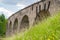 The old Austrian stone railway bridge viaduct