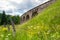 The old Austrian stone railway bridge viaductand bicycle near it