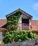 Old balcony in ancient fisherman's cottage, overgrown with grapes. Traditional architecture of Vrboska village, Hvar