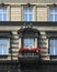 Old balcony with red flowers