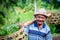 Old balinese man carrying his goods to market