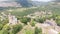 Old Balkan fortress on Bulgaria, world heritage in Veliko Tarnovo. Historical structure medieval castle on a hill. Drone aerial