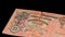 Old banknote of Tsarist Russia, ruble on a black background