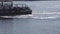 An old barge with a tugboat sailing along the river, copy space, transportation, riverboat, industry