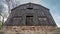 Old barn built on a huge stone fondation