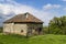 Old barn built from mixed building materials that were available locally such as marl.