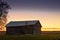 Old Barn House In The Springtime Sunset