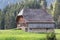 Old barn in a pasture in the Swiss Alps