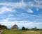 Old barn retro style in a blue sky