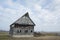 Old barn sitting in field