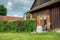 Old barn used as garden house.Sunny day in summer.