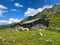 Old barns on the shore of the Lake Giglachsee, Austria