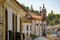 Old baroque church among the houses, balconies and windows