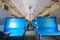 Old basic blue seats in a train of Yangon Circular Railway in Myanmar