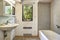 Old bathroom with grey tile wall trim