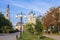 An old beautiful church behind autumn tree. Religious architecture of Russia.