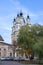 An old beautiful church behind autumn tree. Religious architecture of Russia.