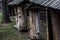 Old beehive on the background of an old house in autumn. Background. Beautiful landscape. Background.