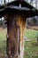 Old beehive on the background of an old house in autumn. Background. Beautiful landscape. Background.