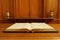 Old Bible open on communion table