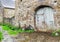 Old bicycle left at the stone fence