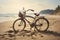 An old bicycle parked on the beach.