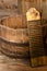 Old big wooden barrel with rusty iron circles