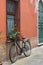 Old bike standing in a typical italian narrow street, Portovenere, Italy