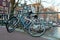 Old bikes on a bridge in Amsterdam the Netherlands