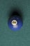 Old billiard ball number 2 blue color on green billiard table, copy space