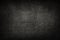 Old black background. Grunge texture. Dark wallpaper. Blackboard