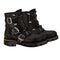 Old black boots with buckles and laces
