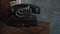 An old black dial telephone