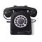 Old black landline telephone. An old means of communication.