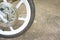 Old black magnesium alloy wheel of motorcycle and disc brake