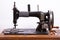 Old black manual sewing machine for sewing