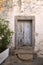 Old blue door in stone wall