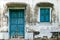 Old blue iron door of grungy abandoned house in Havana, Cuba