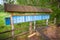 Old blue mailboxes in a row